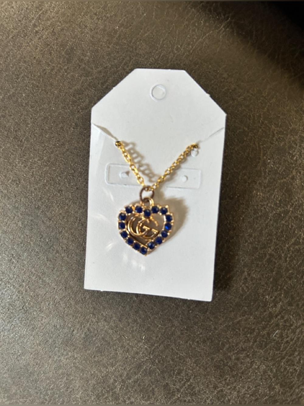 Gold Heart Pendant Necklace with Blue Stones